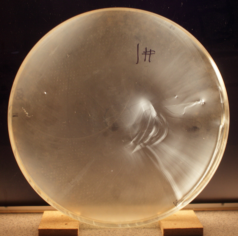 Glass with non-homogenous area